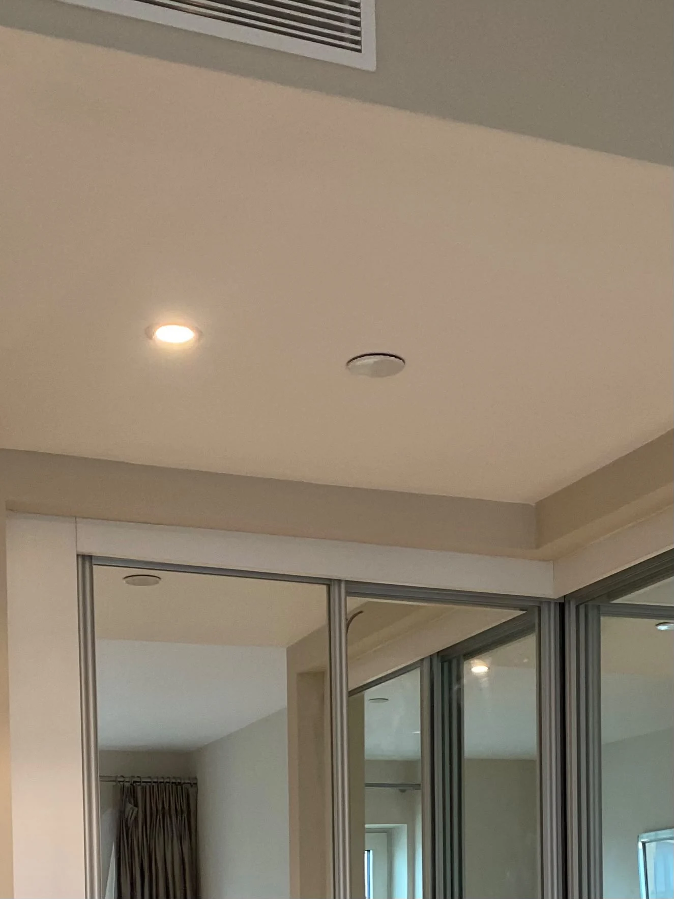 Ceiling repaired and finished above glass doors